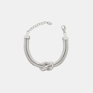 Silver snake chain bracelet with a knot detail and adjustable clasp
