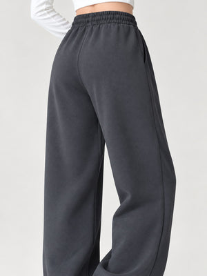 sweatpants in light gray with seam detail and full-length