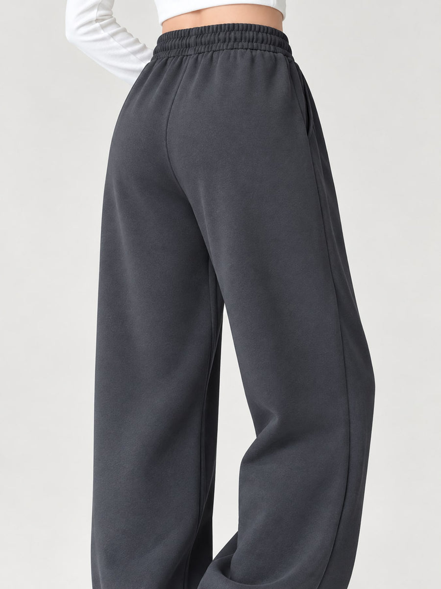sweatpants in light gray with seam detail and full-length