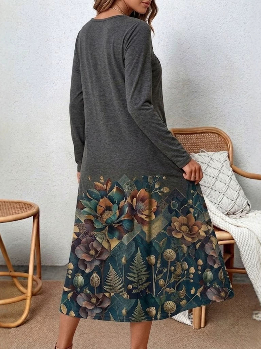 teal midi dress featuring decorative button and floral