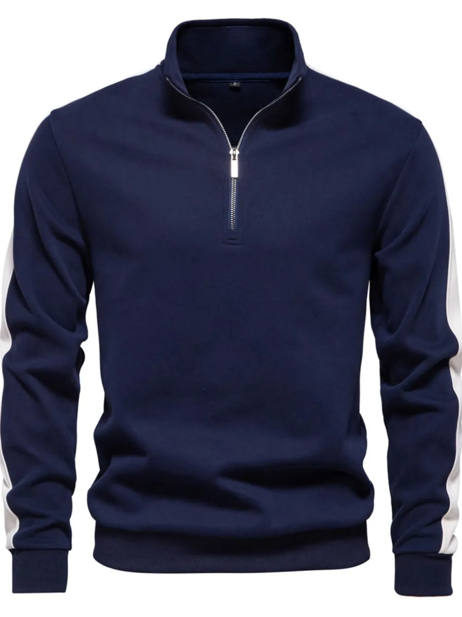 Navy quarter-zip sweatshirt with white side stripes on sleeves and a silver zipper.