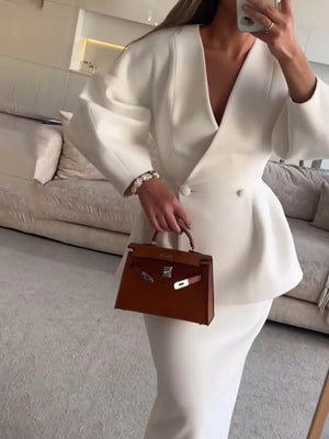 100% polyester Care instructions: Machine wash cold blazer in ivory with fitted silhouette