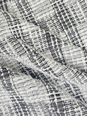 mini dress featuring plaid in white with 100% polyester Care instructions: Machine wash cold texture