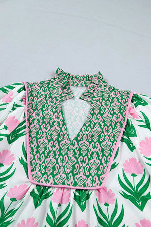 Playful floral v-neck blouse with puff sleeves, green and pink pattern, frill collar, polyester