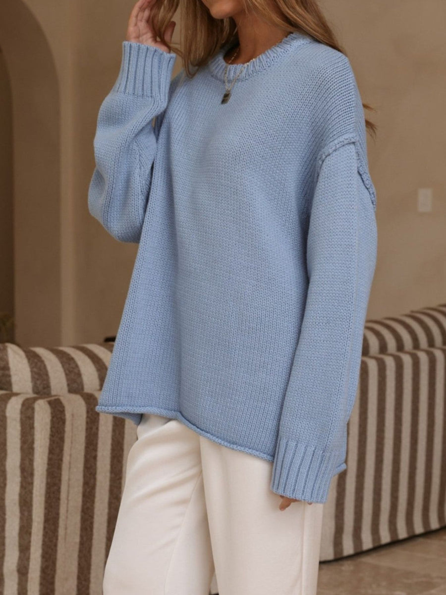 Blue pullover sweater with ribbed cuffs and long sleeve