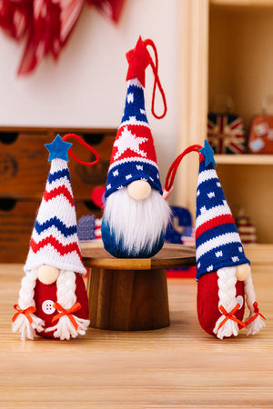 Patriotic knit gnome ornaments in red, white, and blue with stars and stripes.