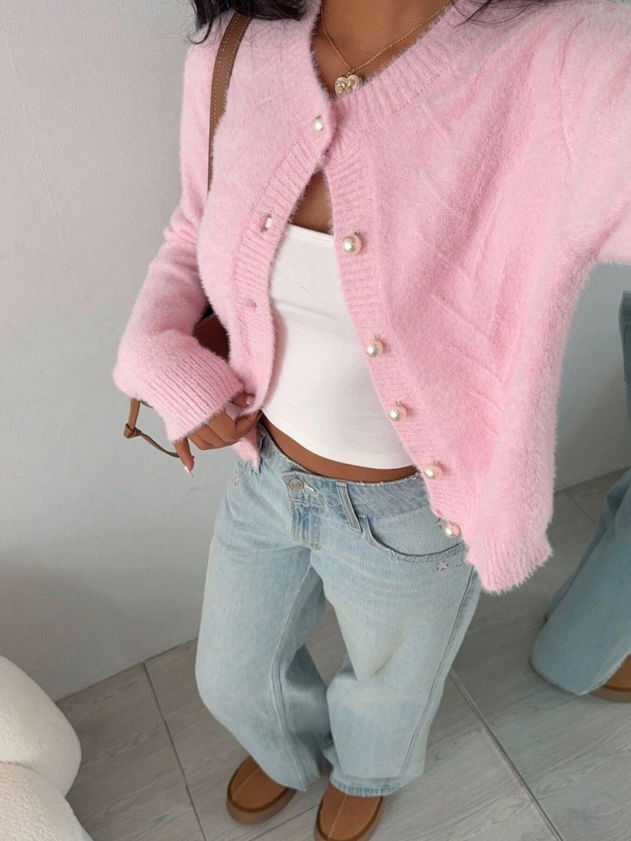 100% polyester Care instructions: Machine wash cold cardigan in baby pink with regular silhouette