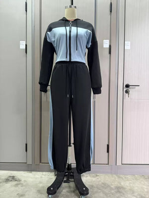 light blue tracksuit featuring drawstring and color-block