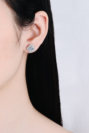 Square halo moissanite stud earrings in silver with clear stones.