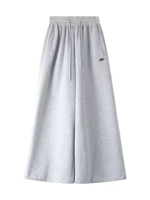 wide-leg pants in light grey with drawstring waist and full-length