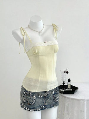 100% polyester Care instructions: Machine wash cold camisole in White with fitted silhouette
