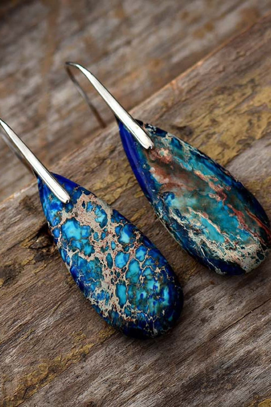 Ocean Jasper dangle earrings in blue/silver with unique marbled patterns.
