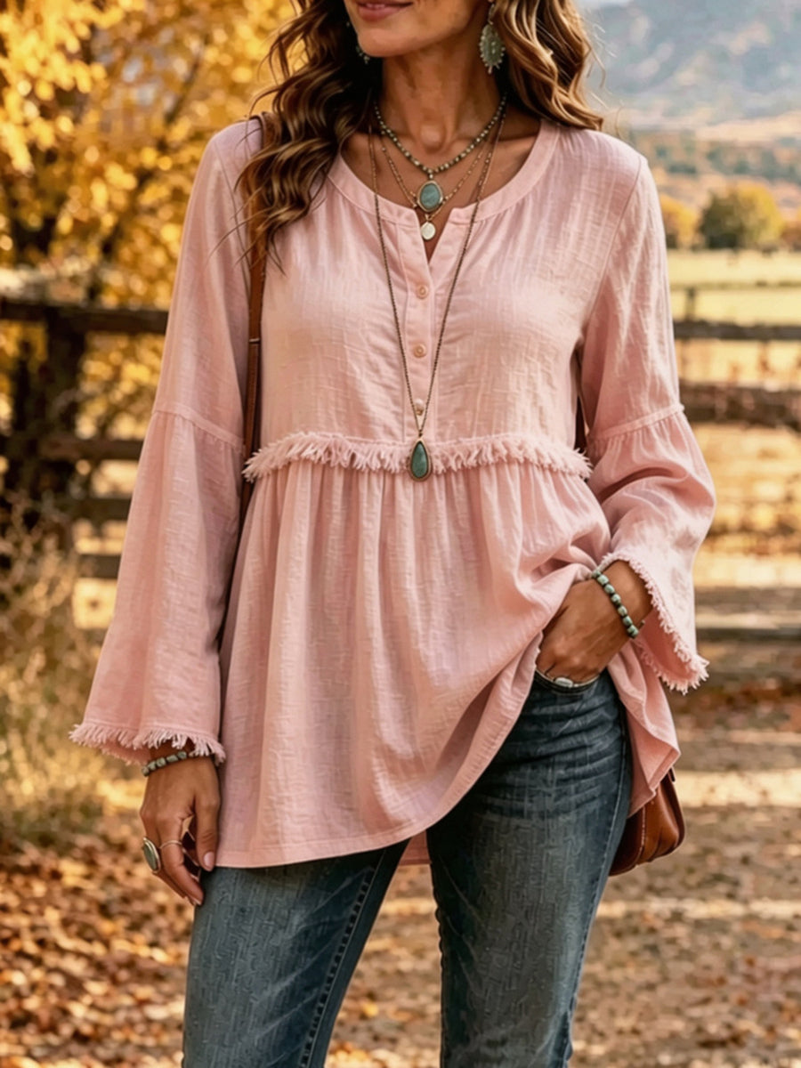 blouse in blush pink featuring buttoned and relaxed fit