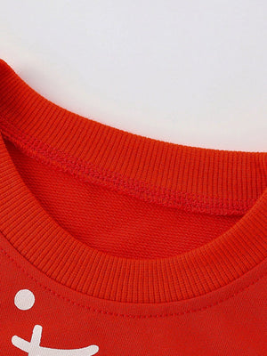 Red crew neck sweatshirt with white cat graphic detail