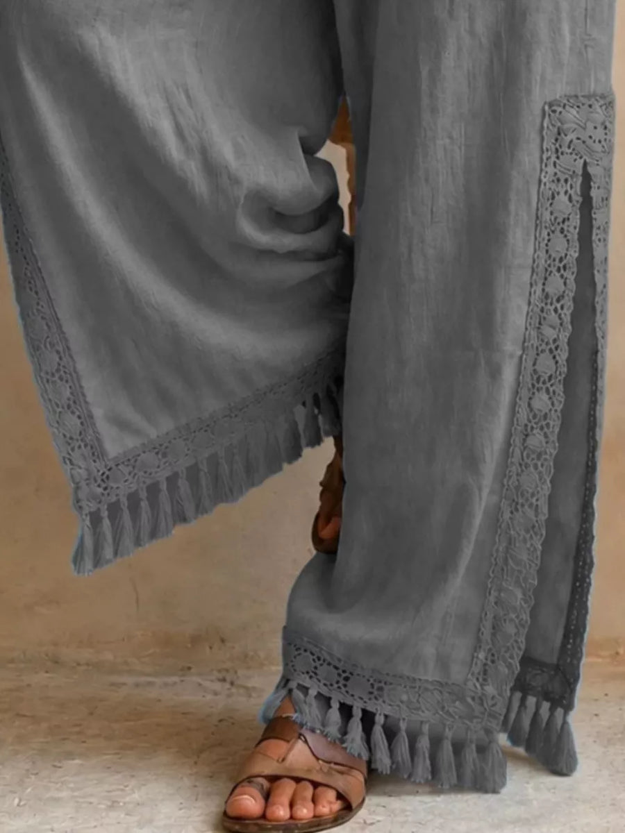wide-leg pants in Black with drawstring waist and full-length