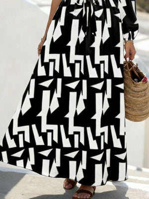 100% polyester Care instructions: Machine wash cold maxi dress in Black with A-line silhouette