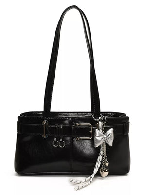 Black shoulder bag with buckle detail and silver bow charm