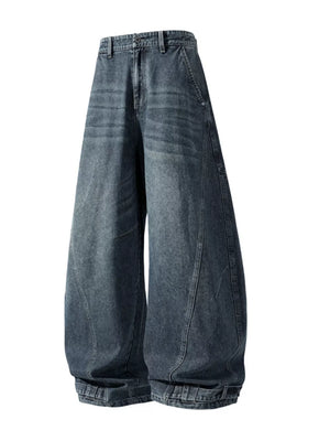 Men's baggy dark wash jeans with cinched hems