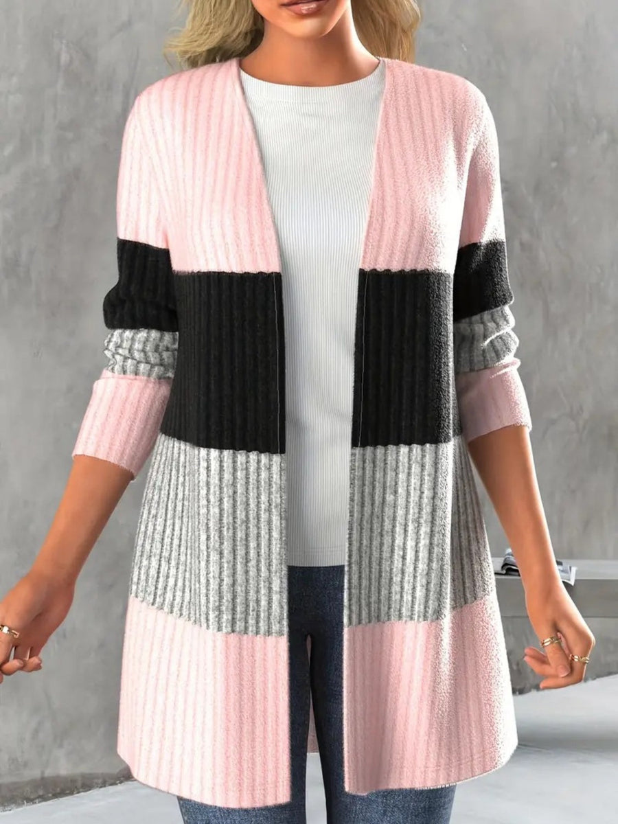 Monochrome block ribbed cardigan in pink, black, and grey stripes.