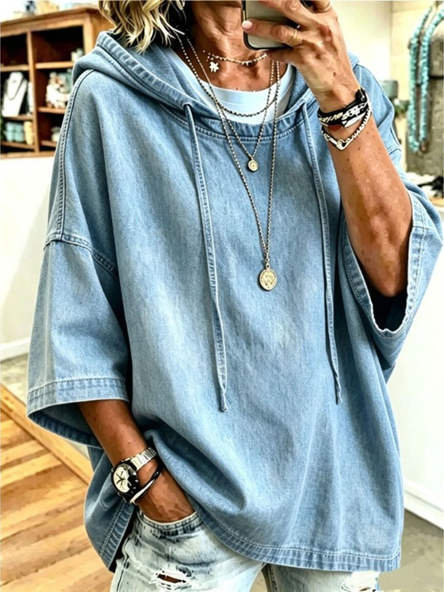 pullover hoodie in light blue featuring hood and oversized fit