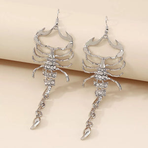 earrings in clear with dangle and long