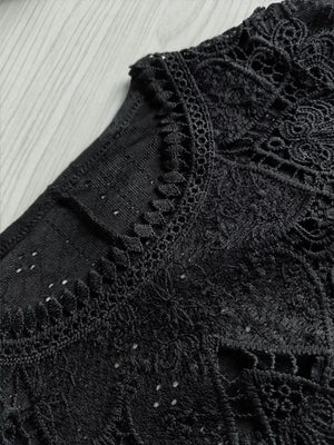 Black long sleeve t-shirt with intricate lace embellishments on the neckline and yoke.