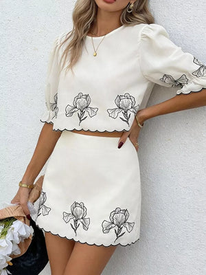 White embroidered floral two-piece set with scallop trim crop top and mini skirt