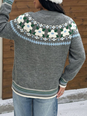 light blue pullover sweater with ribbed cuffs and long sleeve