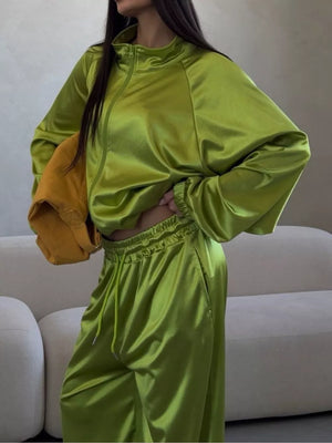 track jacket in lime green featuring drawstring and relaxed fit