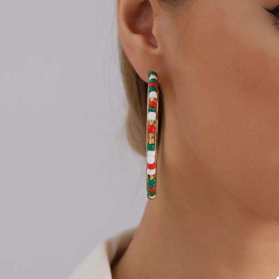 earrings in gold with beaded and beaded
