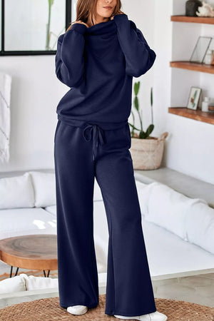 50% polyester, 45% viscose, 5% elastane Care instructions: Machine wash cold lounge set in Dark Navy with relaxed silhouette
