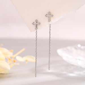 earrings in silver featuring cross motif and dangle fit