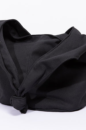Black canvas shoulder bag with knotted strap detail