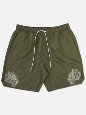 Army green performance shorts with embroidered wolf heads and white drawstring.