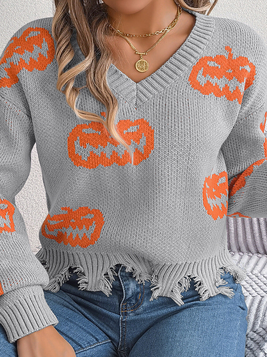 pullover sweater in light gray with pumpkin and raw hem