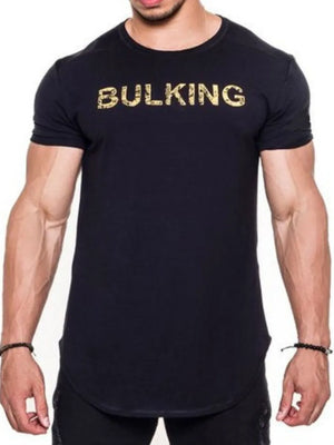 Black t-shirt with gold "BULKING" graphic, crew neck, short sleeves, curved hem.