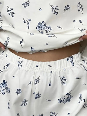 pajama set featuring ditsy floral in White with 100% polyester Care instructions: Machine wash cold texture