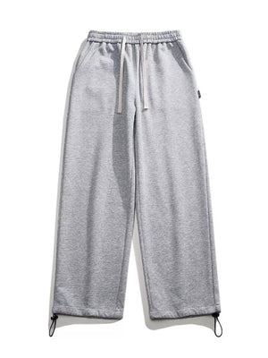 Light gray cotton sweatpants with drawstring waist and adjustable ankle cuffs.