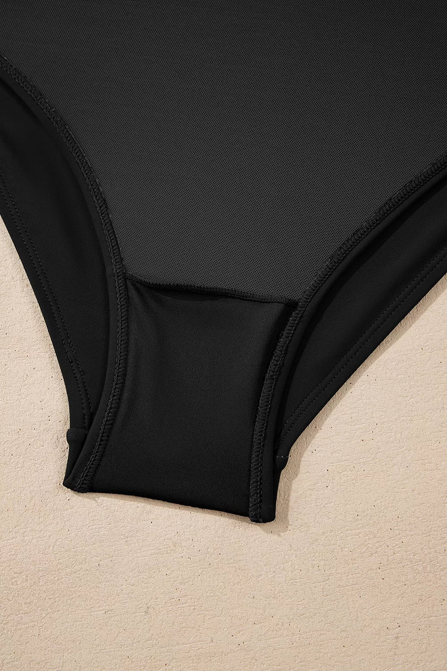 one-piece swimsuit in black with ruched and full-length