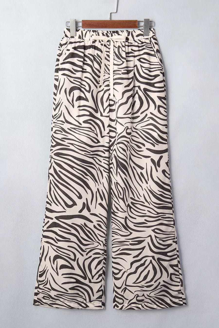 wide-leg pants featuring zebra-print in dark olive green with 100% polyester Care instructions: Machine wash cold texture