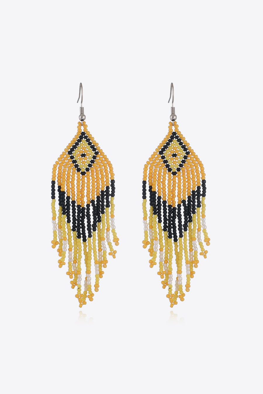 Beaded diamond fringe earrings in yellow, black, and white with boho styling.