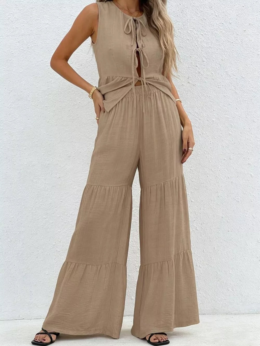 Beige tie-front ruffled sleeveless top with tiered wide-leg pants set
