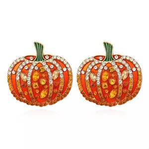 earrings in gold with motif and rhinestone embellishment