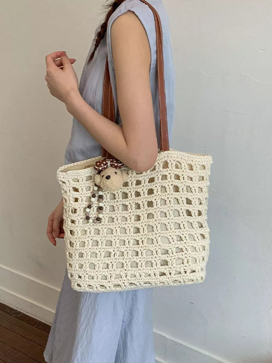 handbag featuring geometric in brown with Straw weaving Imported Size & texture