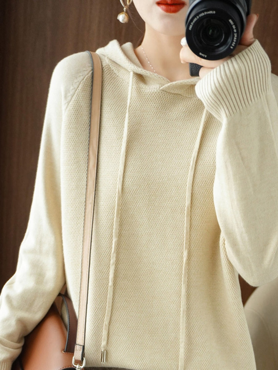 pullover sweater in cream featuring drawstring and regular fit