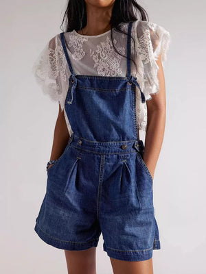 overalls in medium wash denim featuring pleated and relaxed fit