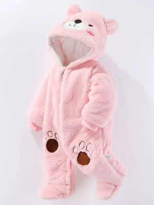 Pink fleece baby snowsuit with bear hood and paw print details.
