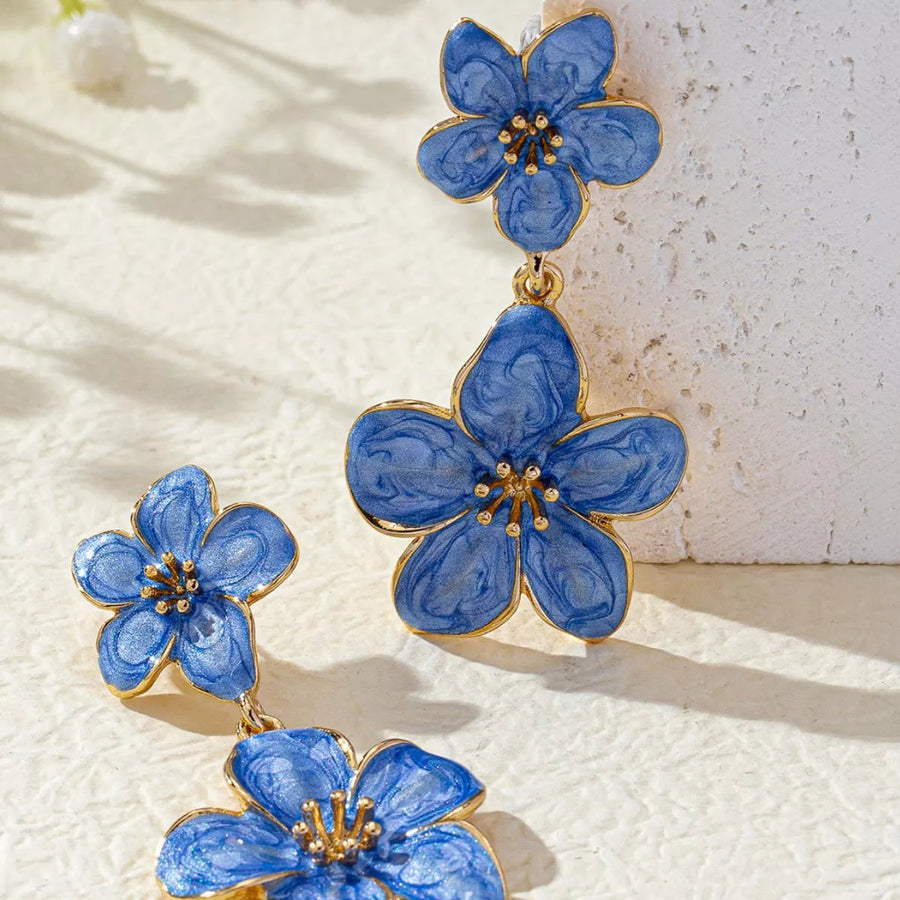 Blue flower dangle earrings with 18K gold plated details