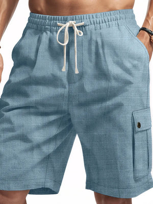 Light blue textured cargo shorts with drawstring and buttoned cargo pocket.