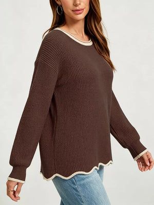 100% polyester Care instructions: Machine wash cold pullover sweater in ivory with regular silhouette